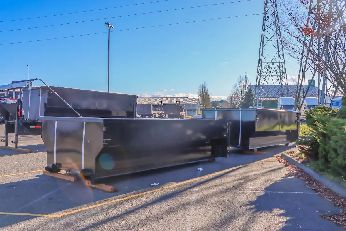 Roll-off dumpster ready for waste disposal at job site for Construction Dumpster Rental in Springfield